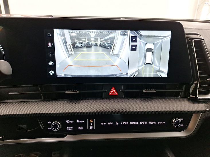 Kia Sportage — photo 12